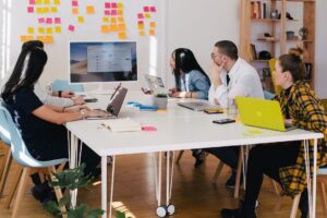 A team in an office discussing intelligent search in an office